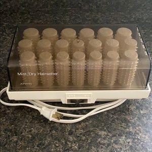 Set of 20 heated hair rollers with bobby pins.